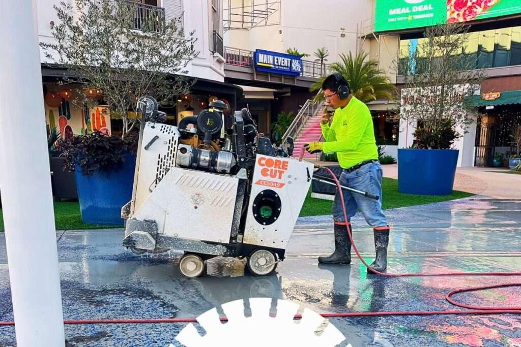 slab sawing on commercial construction job site
