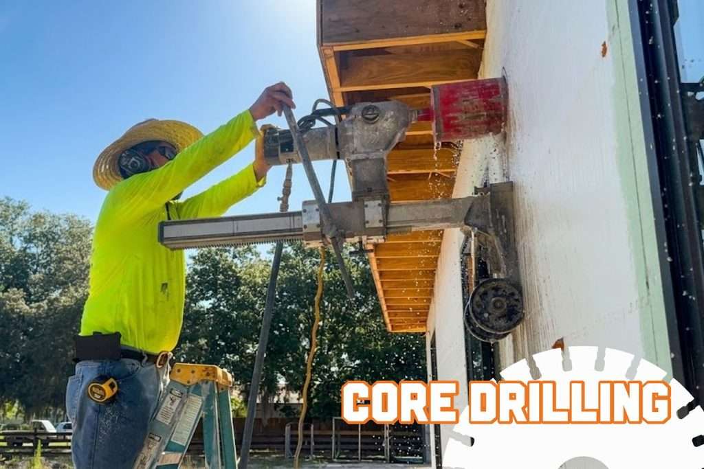 Core drilling equipment boring into reinforced concrete on a commercial industrial project